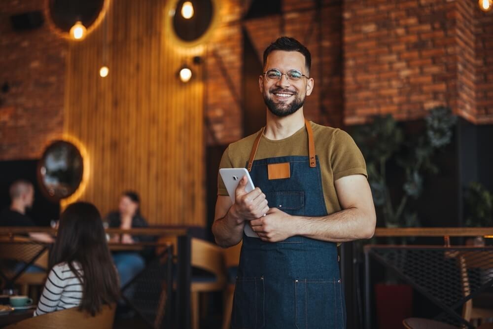 Restaurant owner reviewing hospitality insurance coverage in Peoria, IL